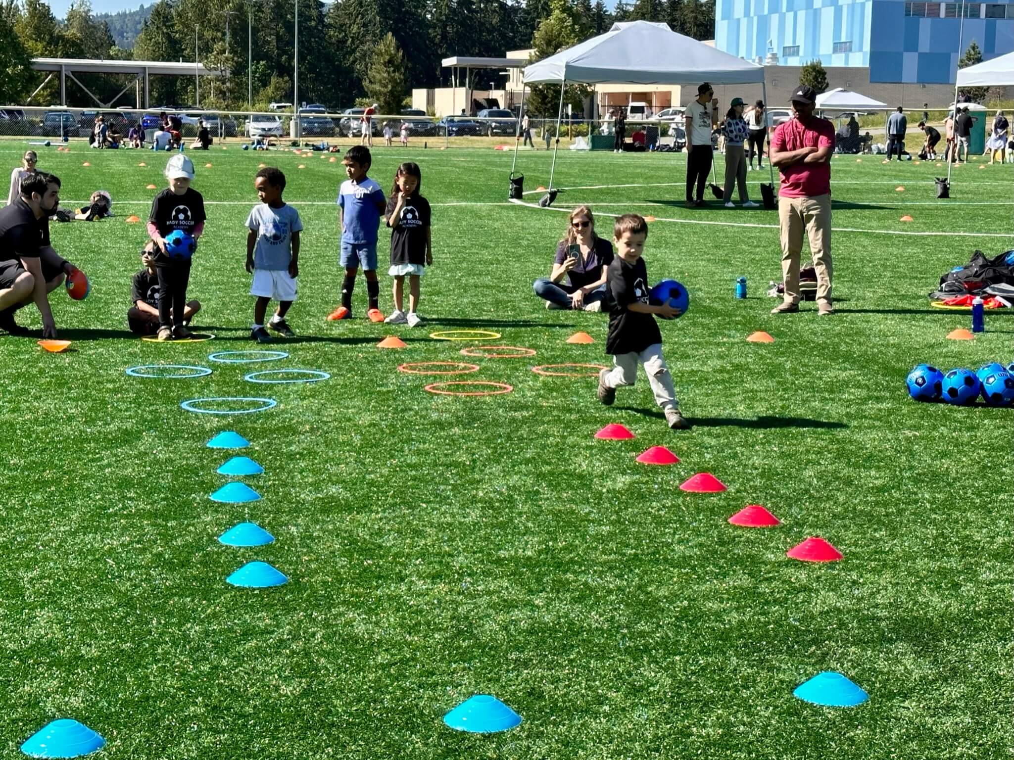 Child practicing goalie skills